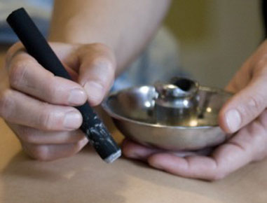Moxibustion is a form of heat therapy in which dried plant materials called 'moxa' are burned on or very near the surface of the skin. Moxa is usually made from the dried leafy material of Chinese mugwort (<em>Artemesia argyi</em> or <em>A.vlugaris</em>), but it can be made of other substances as well. The glowing end of the moxa stick is held about an inch or two above the surface of the skin until the area reddens and becomes suffused with warmth.